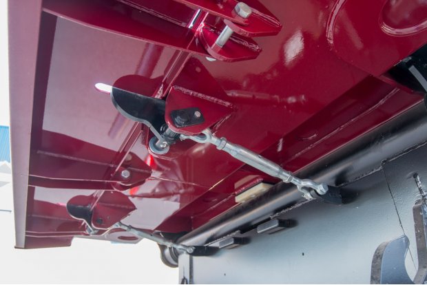 Запорный механизм заднего борта