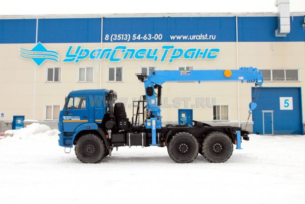 Тягач Камаз с КМУ DONGYANG SS1926