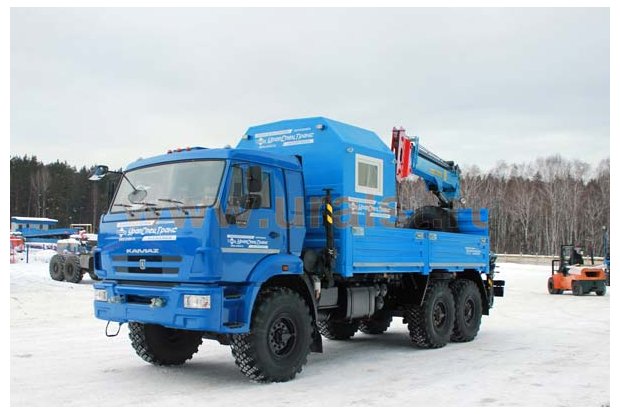 Камаз бортовой с КМУ и кузовом-фургоном