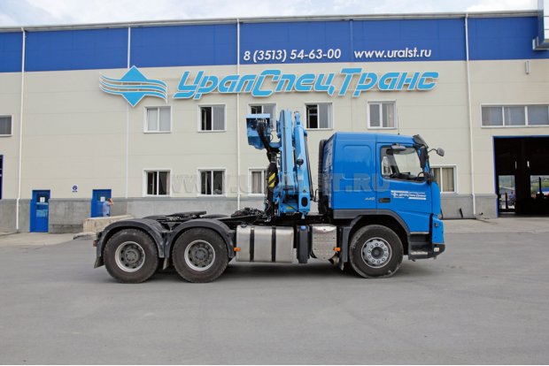 Седельный тягач Volvo FM-Truck с краном-манипулятором ИМ-180-05