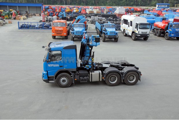 Седельный тягач Volvo FM-Truck с КМУ ИМ-180-05