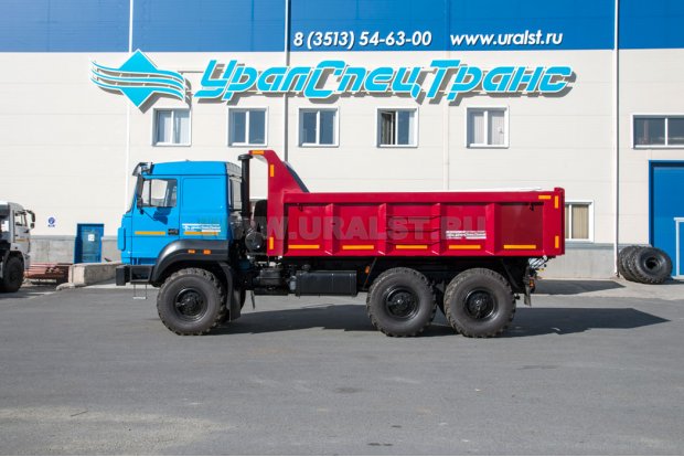 Автомобиль самосвал Урал 55571 с задним бортом