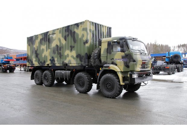 Автомобиль контейнеровоз Камаз 63501 с контернером на платформе