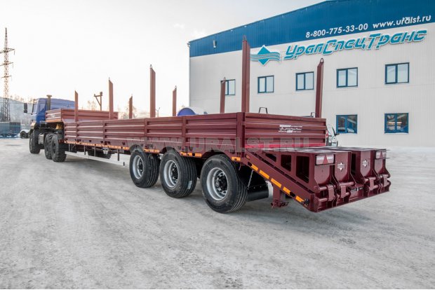 Полуприцеп тяжеловоз ППТ 26-32-11КБ УСТ 9465, уголковые трапы