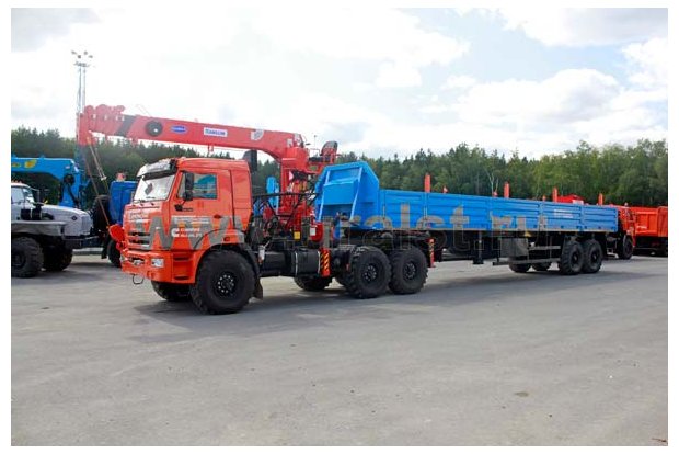 Седельный тягач Камаз с КМУ Kanglim KS1256G-II и бортовый полуприцепом
