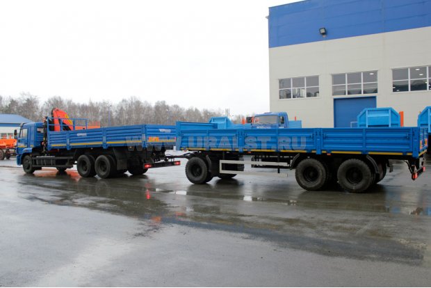 Автомобиль бортовой Камаз 65117-78 с КМУ Palfinger PK-23500А и Бортовой прицеп 83053