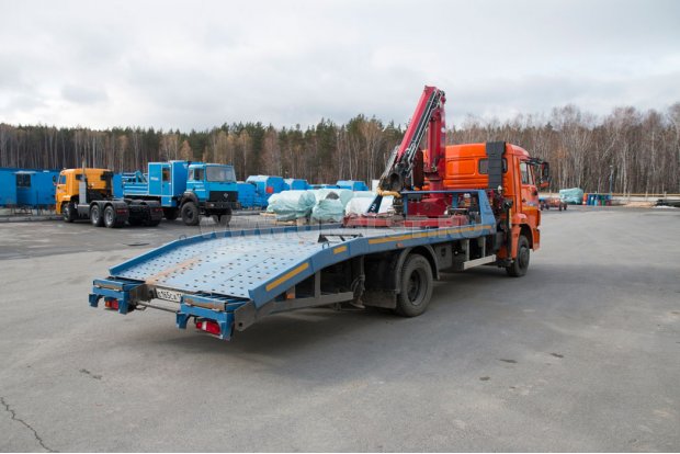 Эвакуатор с КМУ