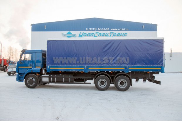 Бортовой автомобиль Камаз 65117-50 с тентом
