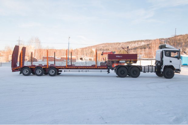 Полуприцеп-тяжеловоз 38-31-11КУ + Тягач SHACMAN 