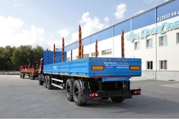 Бортовой полуприцеп с модернизированными кониками с увеличенной высото