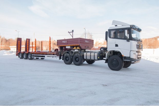 Полуприцеп-тяжеловоз 38-31-11КУ + Тягач SHACMAN 