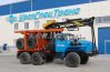 Автопоезд лесовозный тягач Урал 55571 с манипулятором и прицеп-роспуск УСТ 94651С