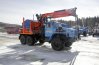Лесовозный тягач Урал с гидроманипулятором Epsilon