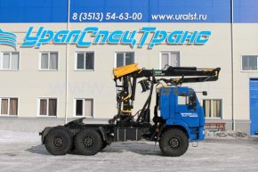 Седельный тягач Камаз с гидроманипулятором ОМТЛ-97